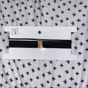 Black choker.
